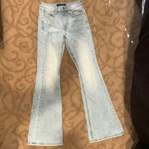 Light blue high rise boot cut jeans